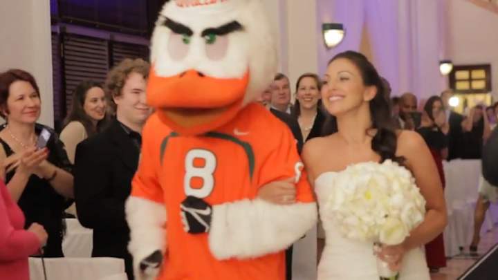 Miami Hurricanes mascot walks bride down the aisle