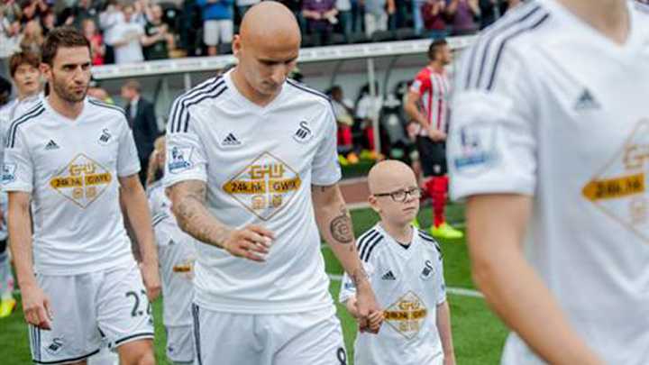 Swansea's Jonjo Shelvey meets 7-year-old fan who has the same disease