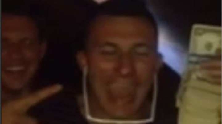 Johnny Manziel Displays Elite Hand Strength and Improvisation Techniques While Using Fat Stack of Cash as a Telephone