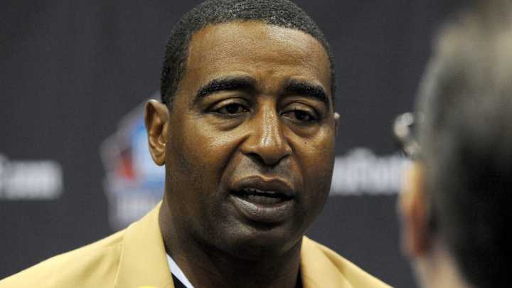 Cris Carter gives emotional response in wake of Adrian Peterson case