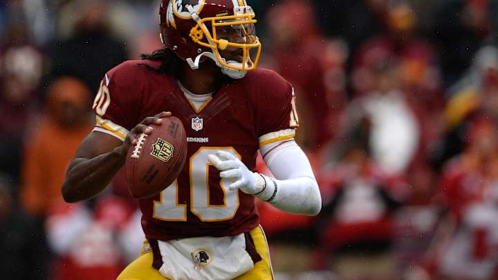 Robert Griffin III isn't worried about receving corps' limited touches Robert Griffin III isn't worried about receving corps' limited touches