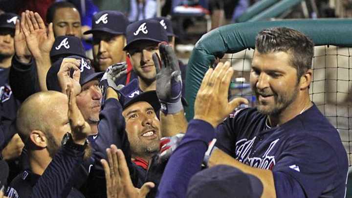 Dan Uggla's grand slam lifts Braves over Phillies in wild NL East affair