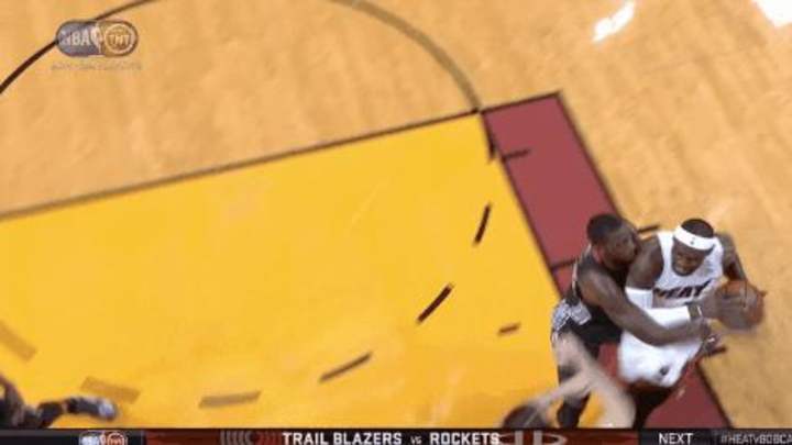 Video: Heat's LeBron James leveled by forearm to throat from Bobcats' Josh McRoberts Video: Heat's LeBron James leveled by forearm to throat from Bobcats' Josh McRoberts