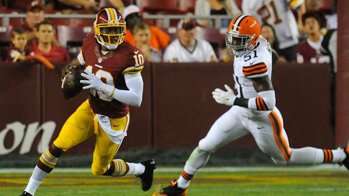 Robert Griffin III bruises thigh, says avoiding hits is a 'work in progress'