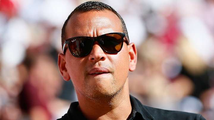 Tony Romo almost ran over Alex Rodriguez before Sunday game