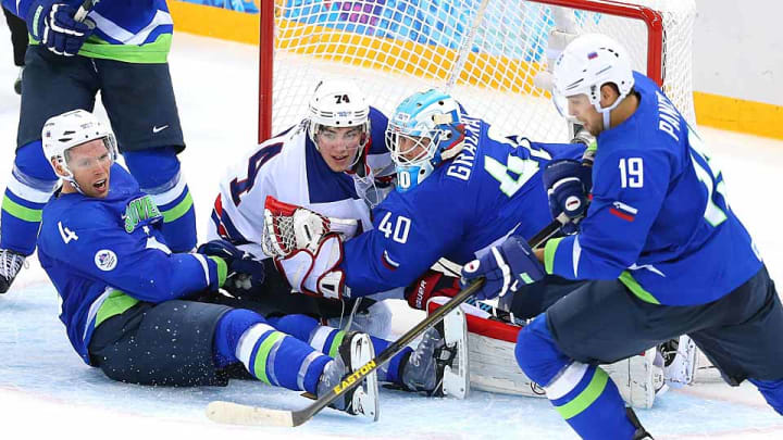T.J. Oshie shares spotlight with Phil Kessel in USA's win over Slovenia T.J. Oshie shares spotlight with Phil Kessel in USA's win over Slovenia