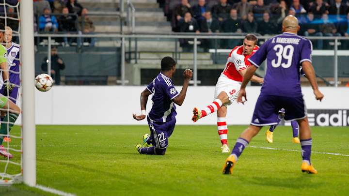 Late Podolski, Gibbs goals give Arsenal dramatic 2-1 win at Anderlecht