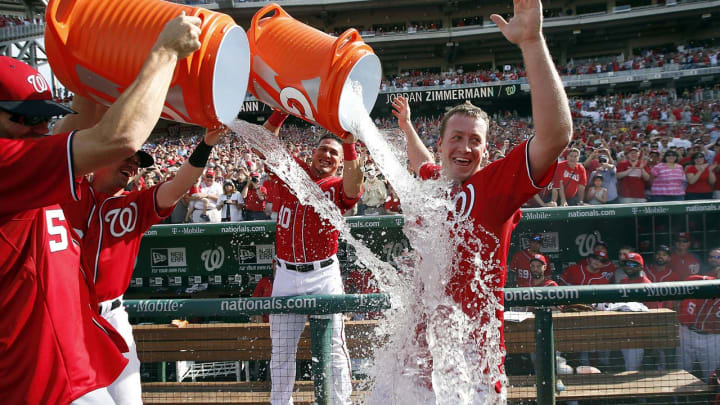 Ballplayers, Managers and Reporters Doused by Coolers