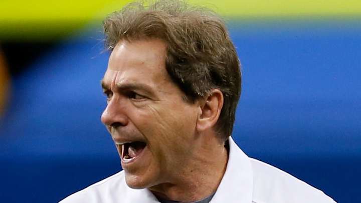 Ole Miss fan gets brutal stiff arm from Nick Saban's security detail