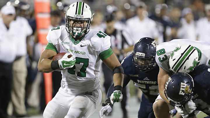 Converted RB Devon Johnson key to Marshall's hopes for a perfect season Converted RB Devon Johnson key to Marshall's hopes for a perfect season