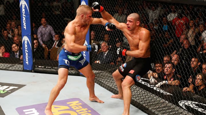 T.J. Dillashaw ends Renan Barão's win streak to win bantamweight belt