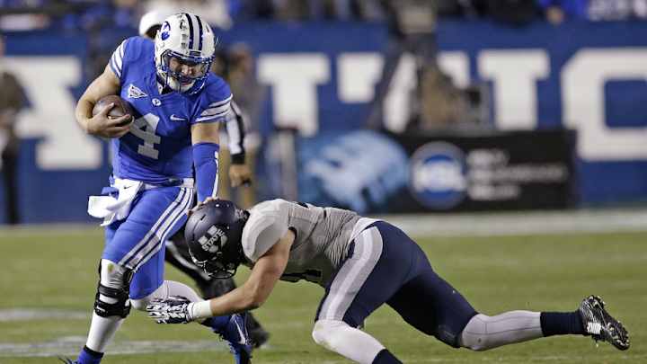 BYU quarterback Taysom Hill fractures left leg against Utah State BYU quarterback Taysom Hill fractures left leg against Utah State