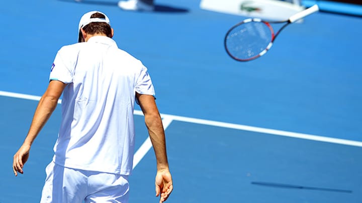 Jerzy Janowicz goes down at Australian Open, reveals he has a broken foot