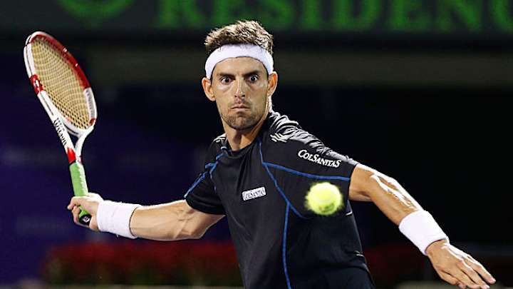 Santiago Giraldo upsets 2nd-seeded Tommy Robredo