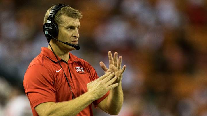 UNLV head coach Bobby Hauck will resign on Monday