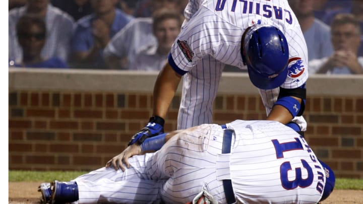 Cubs shortstop Starlin Castro injures ankle on home plate slide