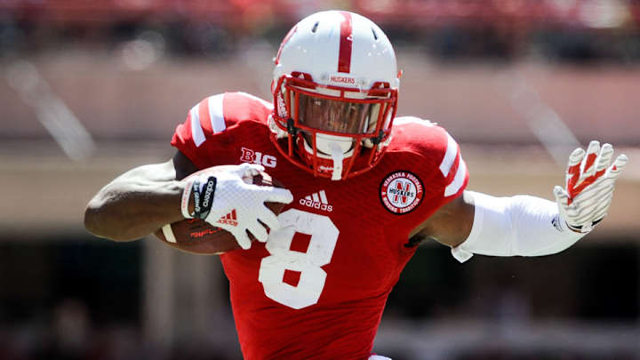 Nebraska RB Ameer Abdullah has a pink umbrella Nebraska RB Ameer Abdullah has a pink umbrella