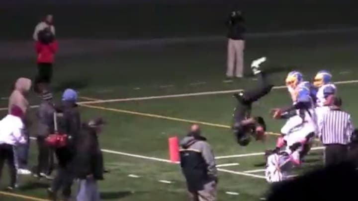 High school QB eludes entire defense, flips into end zone