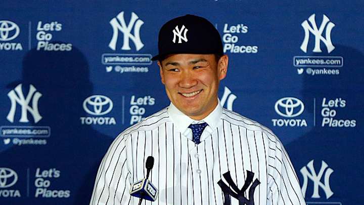 Masahiro Tanaka: 'I'm very happy to be a Yankee' Masahiro Tanaka: 'I'm very happy to be a Yankee'