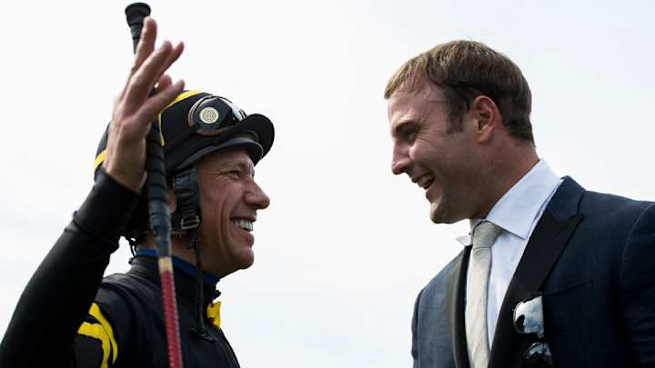 Wes Welker enjoys blending in at English horse track