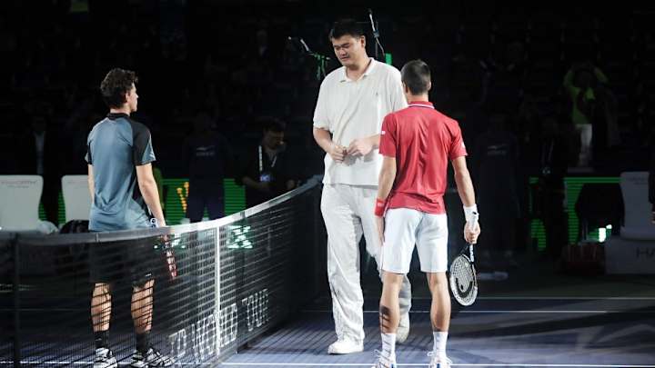 Roger Federer, Novak Djokovic met Yao Ming at the Shanghai Masters Roger Federer, Novak Djokovic met Yao Ming at the Shanghai Masters