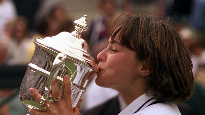 'Swiss Miss' Hingis, now 34, wins French Open doubles match