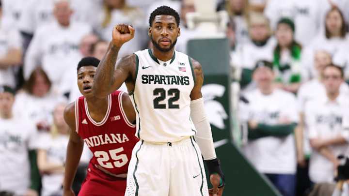 Michigan State's Branden Dawson eats Starburst candy on bench Michigan State's Branden Dawson eats Starburst candy on bench