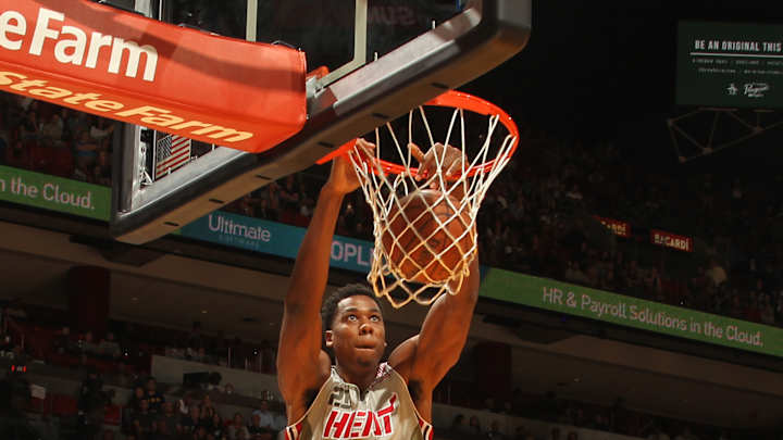 Bosh scores 25, Johnson adds 17 and Heat top Jazz 92-91