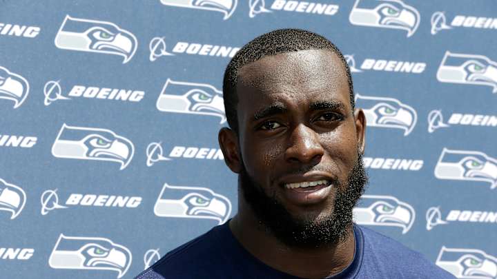 Seattle's Kam Chancellor ends holdout and reports