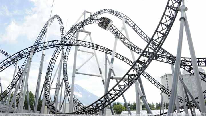 Watch this trick shot from atop a moving roller coaster