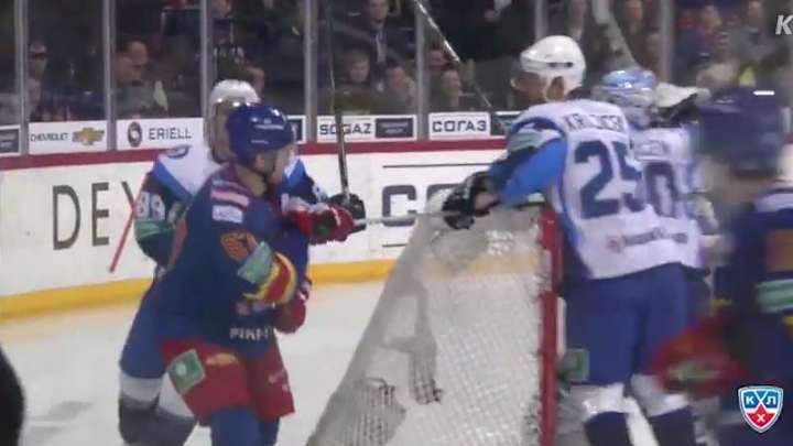 KHL player attempts trick shot with his team leading 6-0