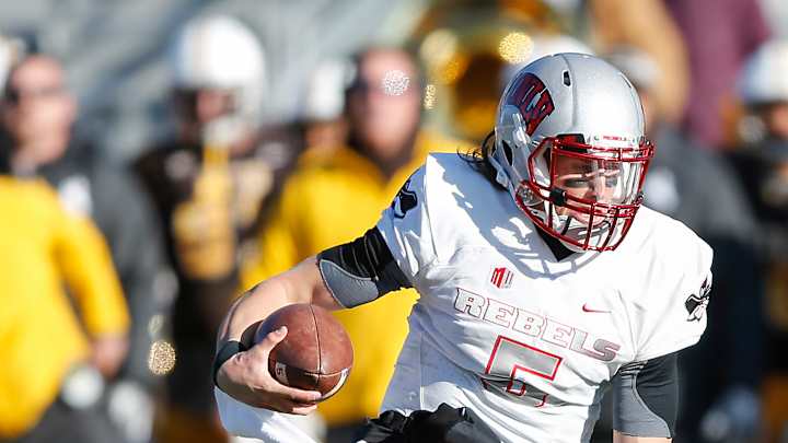 Hill sets school rushing record as Wyoming beats UNLV 35-28