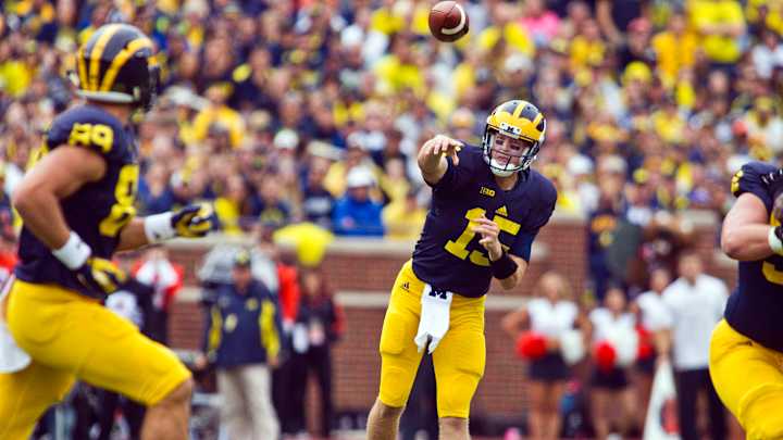 Michigan routs Oregon State 35-7 in Harbaugh's home debut