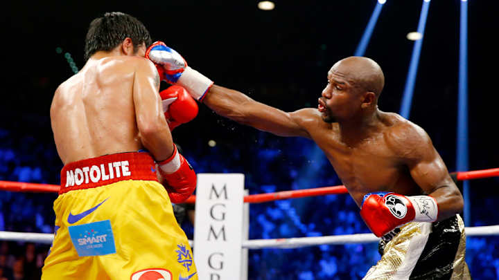 Floyd Mayweather defeats Manny Pacquiao by unanimous decision