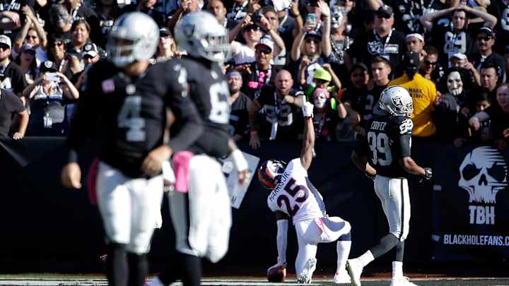 Manning gets last laugh vs. Woodson in Broncos 16-10 win