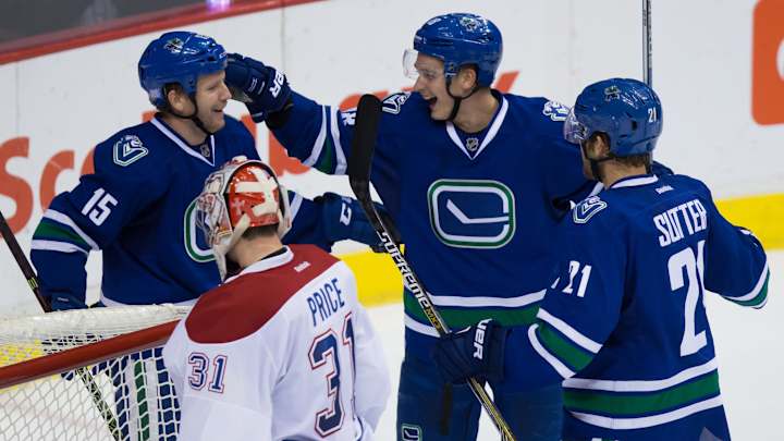 Canucks hand Canadiens first loss of season, 5-1 Canucks hand Canadiens first loss of season, 5-1