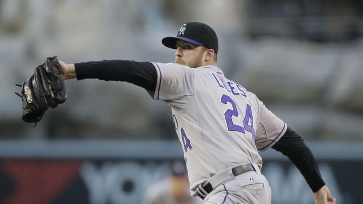Rockies starter Lyles out after getting hit by Pujols' liner