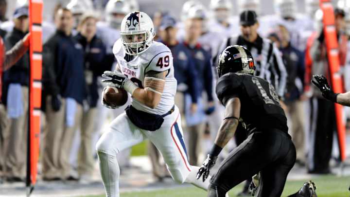 UConn football player charged with assault