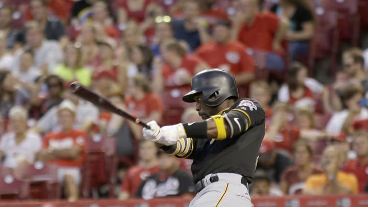 Liriano finally beats Reds as Pirates roll to 7-3 victory