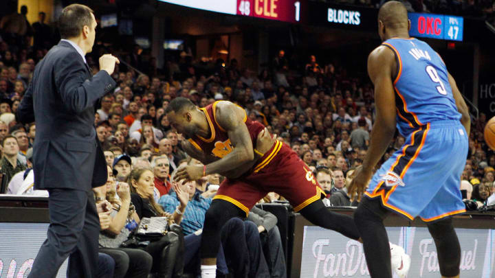 Jason Day’s wife Ellie OK after sideline collision with LeBron James