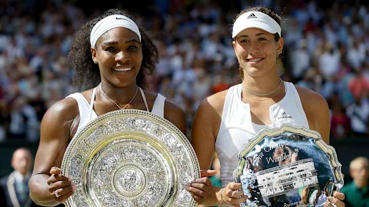 Emotional Muguruza given standing ovation at Wimbledon