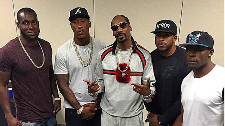 Group of Seahawks meet Snoop Dogg and E-40 Group of Seahawks meet Snoop Dogg and E-40