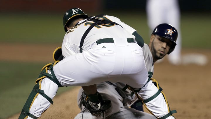 Astros hold off A's 5-4 in 11 after 9 scoreless innings
