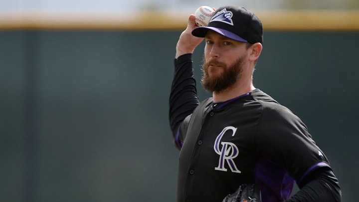 Rockies' John Axford leaves spring camp after son bitten by rattlesnake