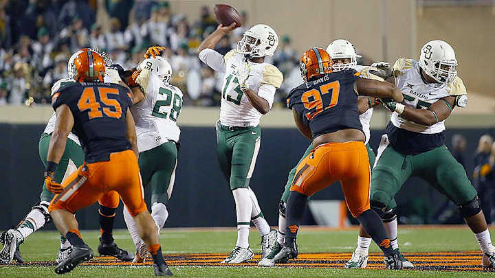 Third-string QB Johnson lifts Baylor over Okla. State, back into playoff mix