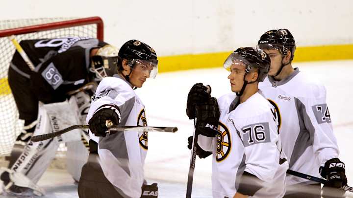 New players, system highlight Bruins' first day of camp