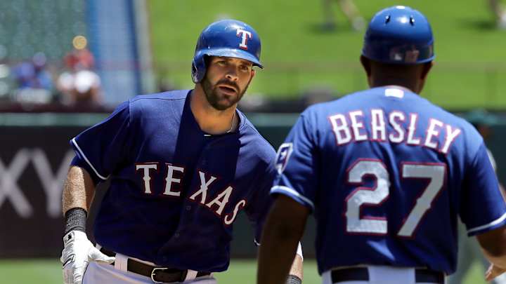 Colby Lewis takes blame for loss as Rangers fall 6-3 to A's