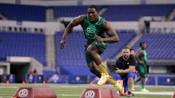 Domestic violence charge against ex-Michigan DE Frank Clark reduced