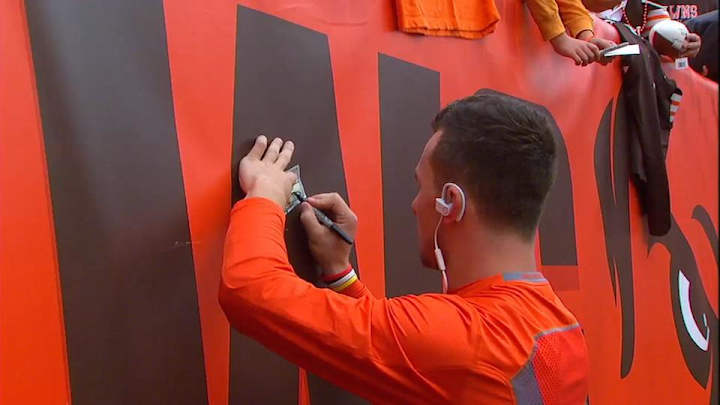 Johnny Manziel signs $100 bill before start vs. 49ers