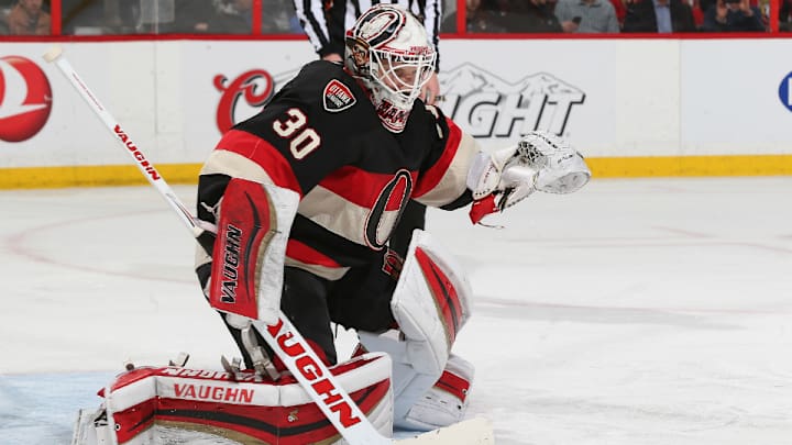 Curtis Lazar eats hamburger thrown on ice in honor of Andrew Hammond Curtis Lazar eats hamburger thrown on ice in honor of Andrew Hammond